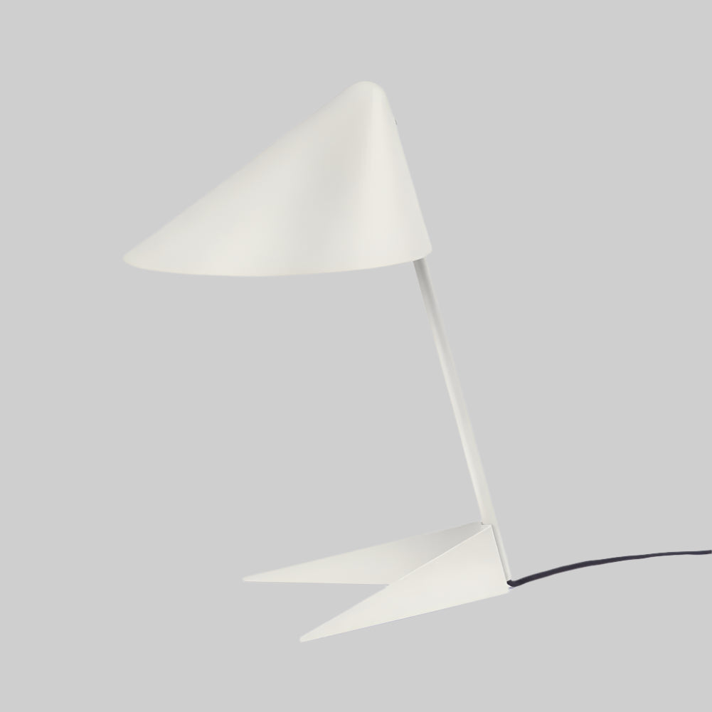 Modern white table lamp with a unique design on a white background