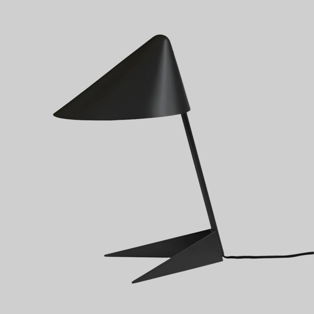 Modern black table lamp with a unique design on a white background