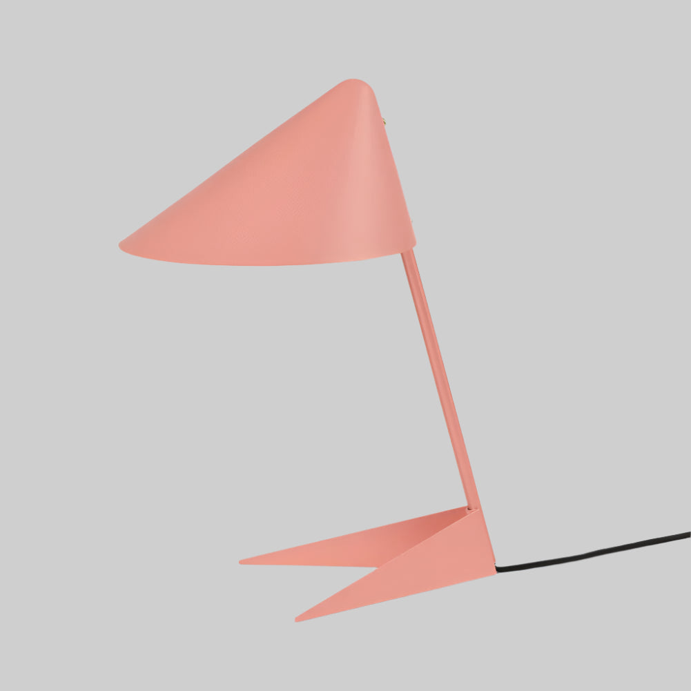 Pink table lamp with a modern design on a white background