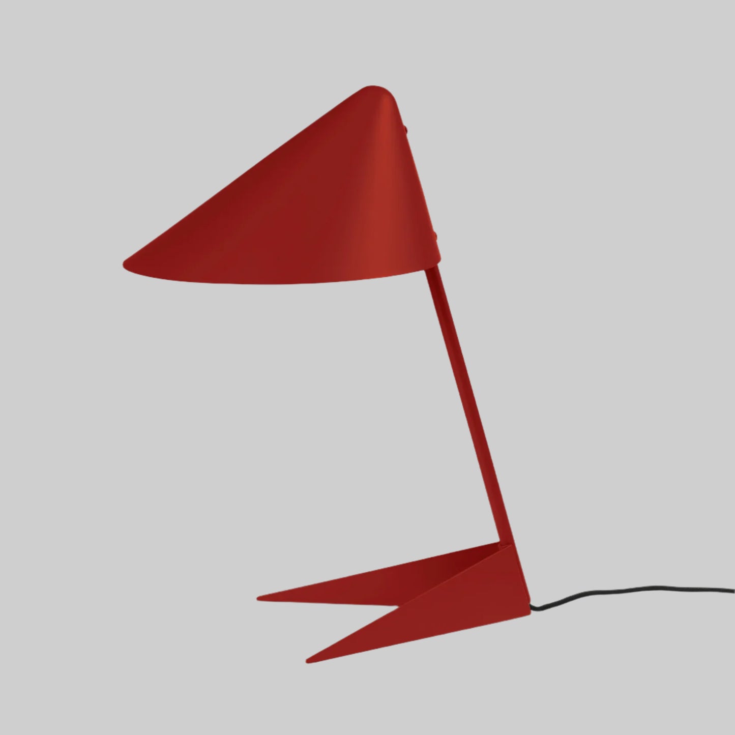 Red lamp with a unique design on a white background