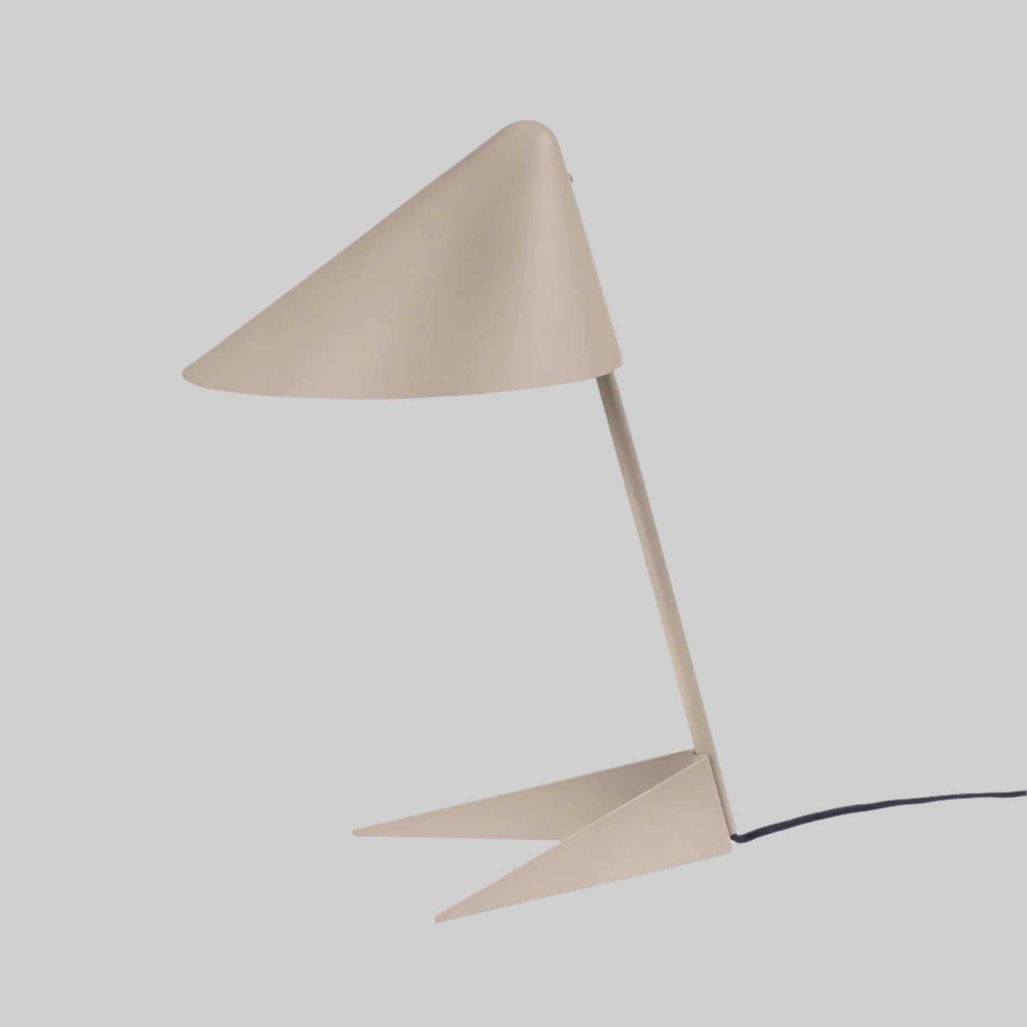 Beige table lamp with a modern design on a white background