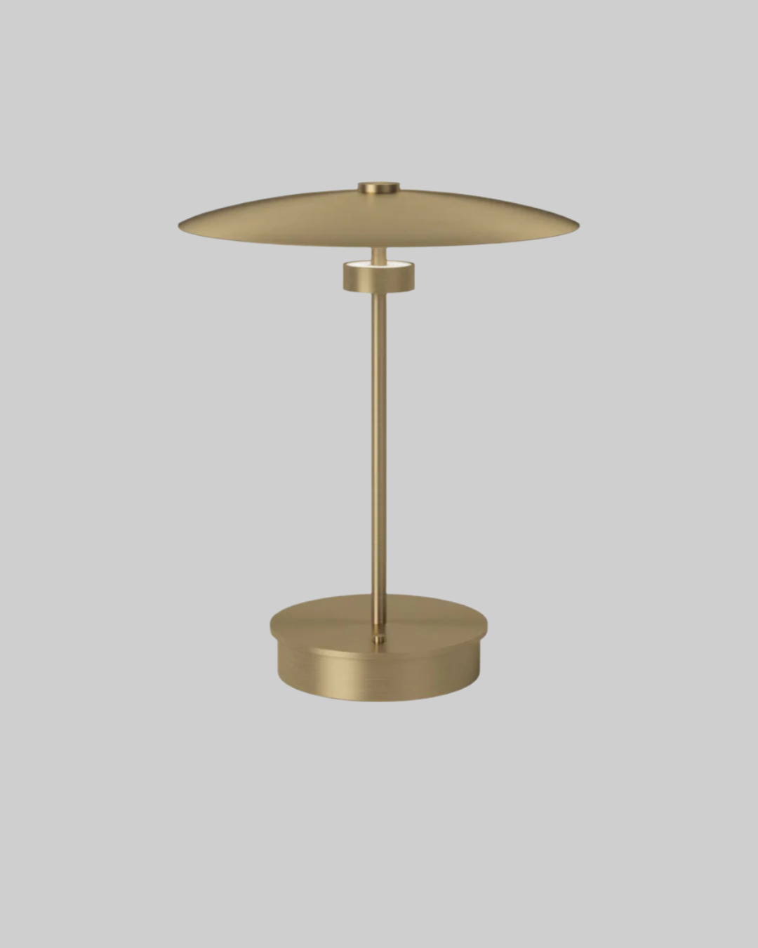 Gold table lamp on a white background