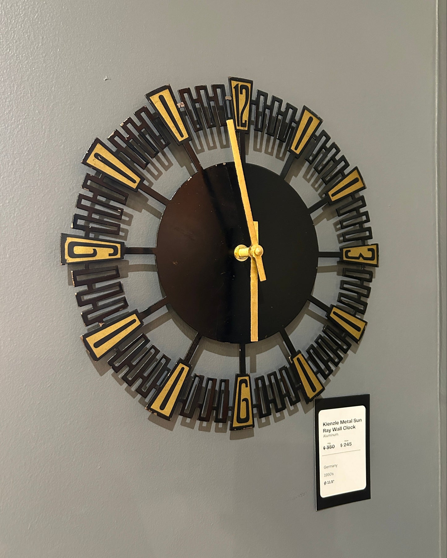 Horloge murale en métal à rayons de soleil Kienzle Allemagne