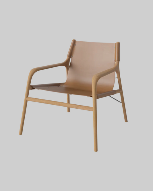 Beige chair with wooden frame on a light gray background