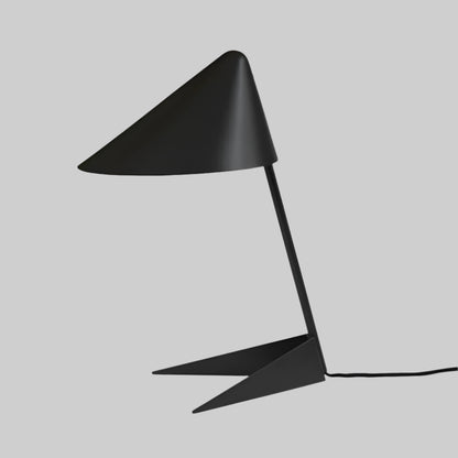 Modern black table lamp with a unique design on a white background