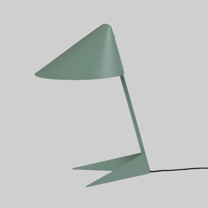 Green table lamp with a unique design on a white background