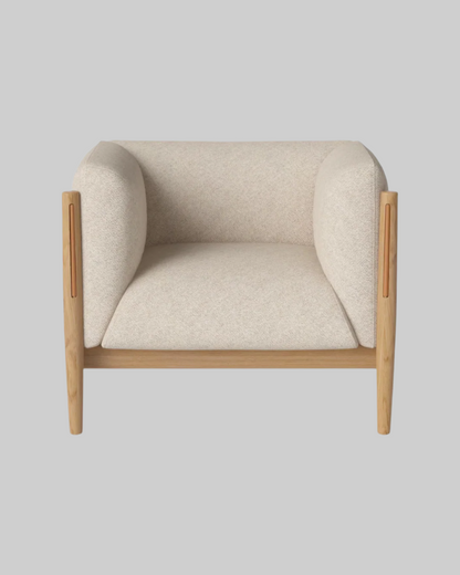 Beige armchair with wooden frame on a white background