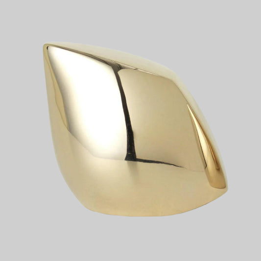 Gold decorative object on a white background