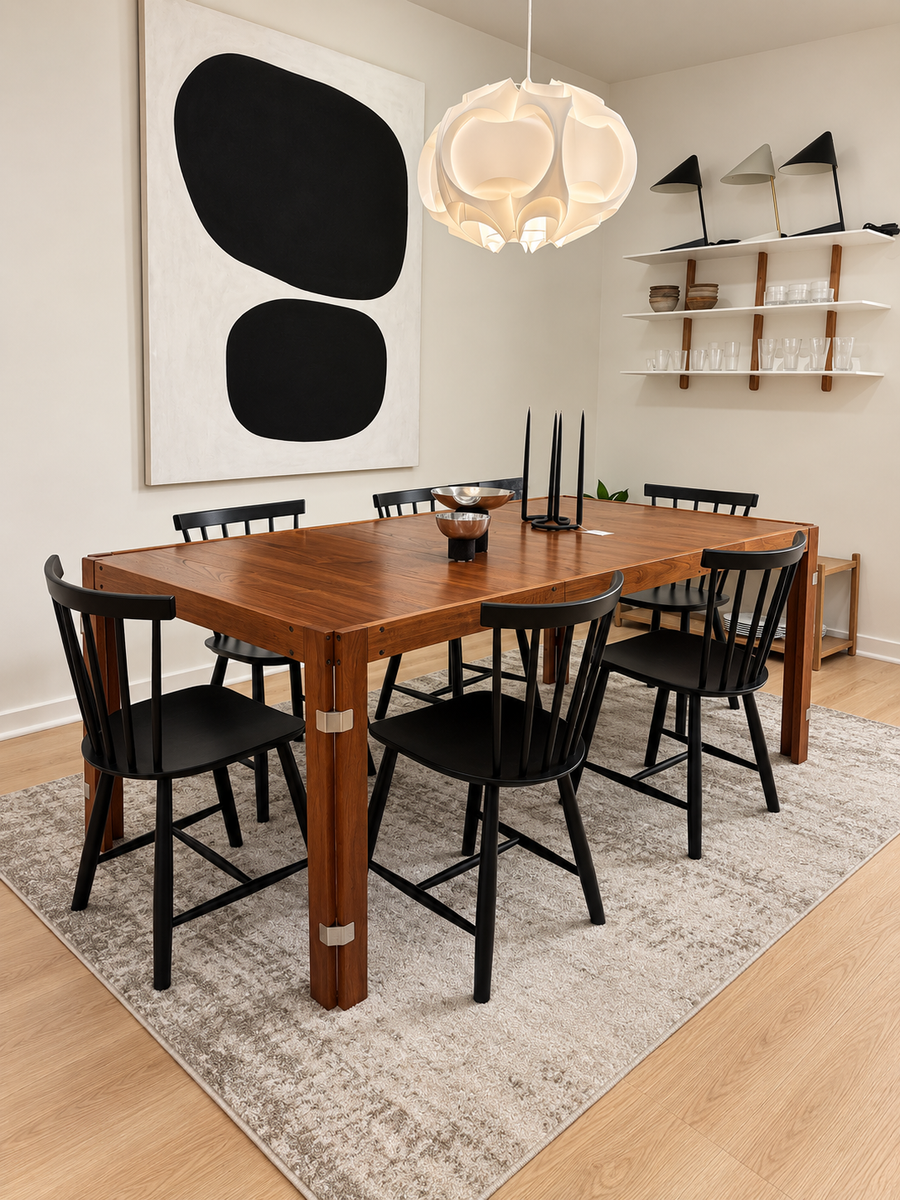 Sculptural Rosewood Dining Table with Brushed Nickel Joinery