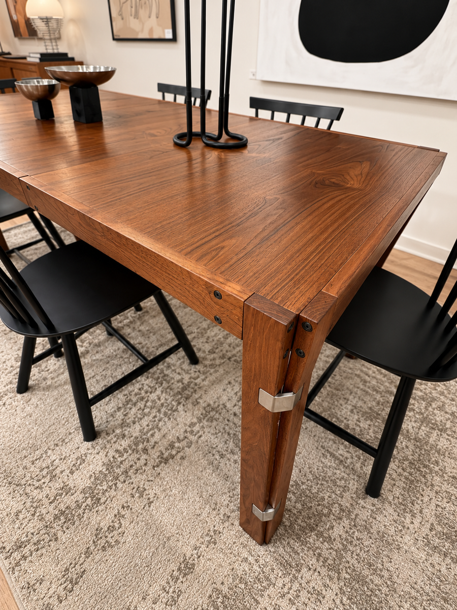 Sculptural Rosewood Dining Table with Brushed Nickel Joinery
