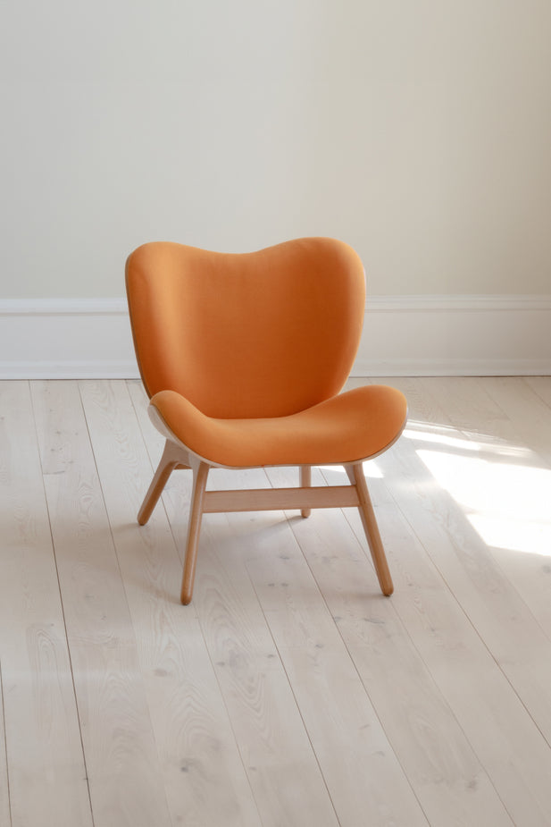 A Conversation Piece Low Accent Chair